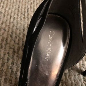 Calvin Klein size 9 never worn shoes.  No returns